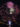 A glowing fireworks display explodes over the Philadelphia Museum of Art and Benjamin Franklin Parkway in a night sky.