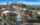 An aerial rendering showing new construction around Stateside Live! in the South Philadelphia Sports Complex. Citizens Bank Park is visible in the background.