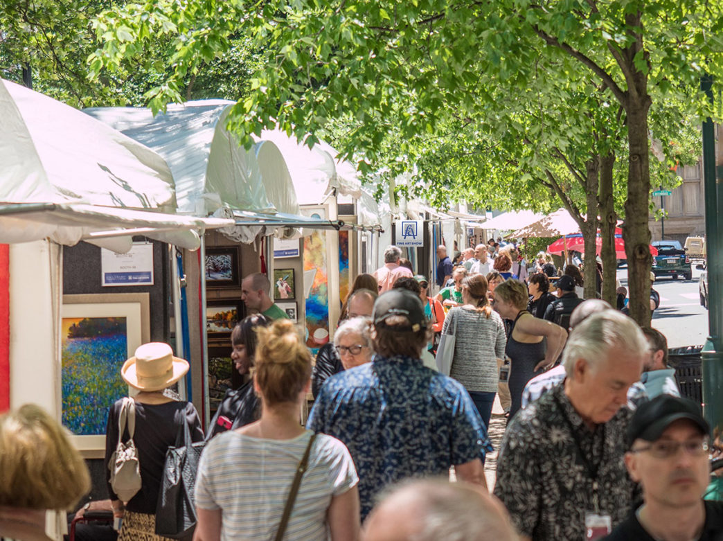 A crowd of people at the Rittenhouse Square Fine Art Show