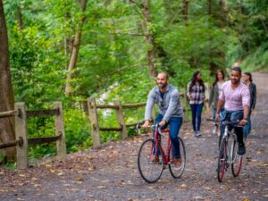 Two people riding bikes at Wissahickon Valley Park